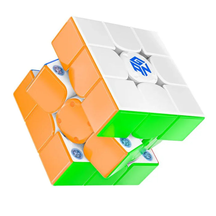 GANCUBE smart speed cube partially twisted, featuring orange, green, and white faces.