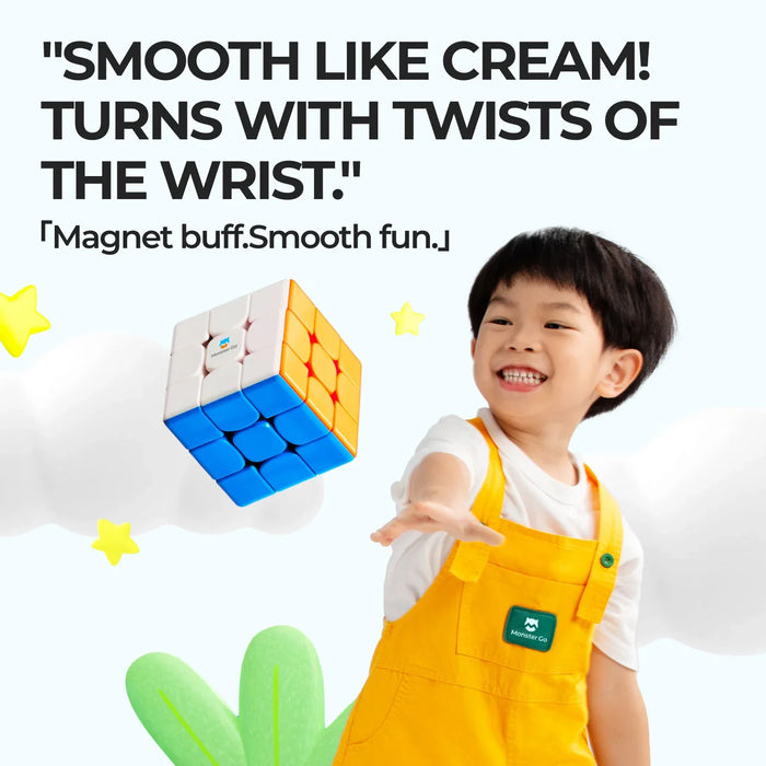 Happy child in yellow overalls playing with a colorful 3x3 magnetic cube puzzle
