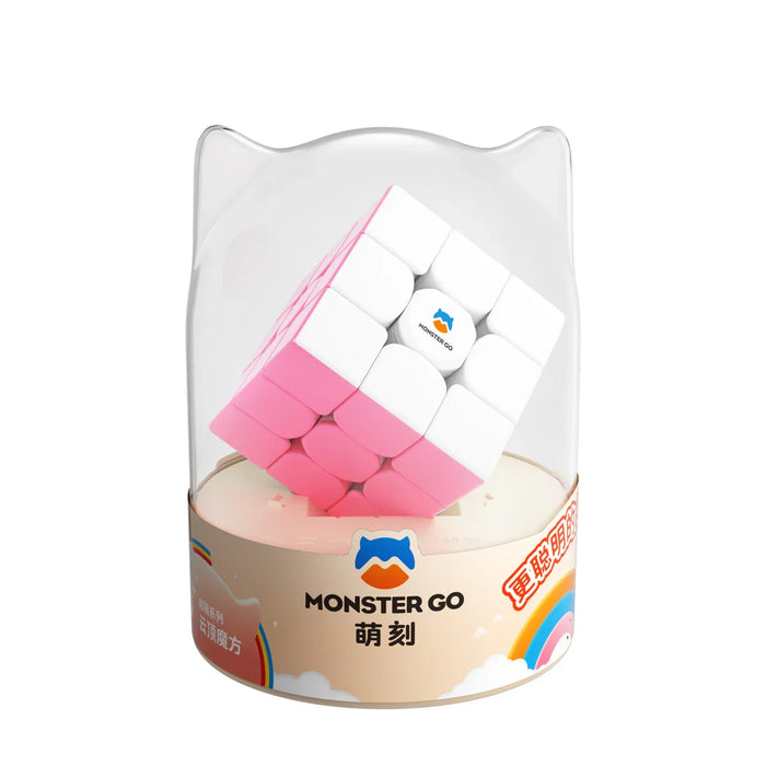 Pink and white Monster Go speed cube puzzle inside transparent cat-ear packaging