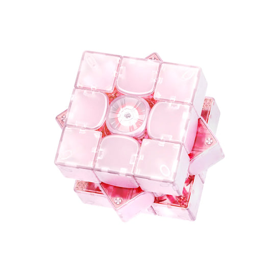 Pink translucent speed cube with glowing core, showcasing advanced smart cube design for speedcubing enthusiasts.