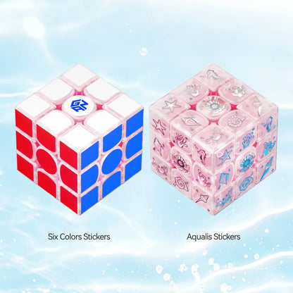 Two speed cubes with Six Colors and Aqualis stickers, featuring vibrant designs and underwater-themed patterns.