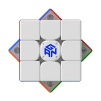 GAN speed cube with blue logo, white face, and colorful edges for puzzle solving