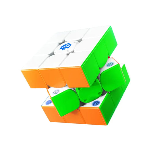 Rubik's Cube-like puzzle with green and orange sides on a white background
