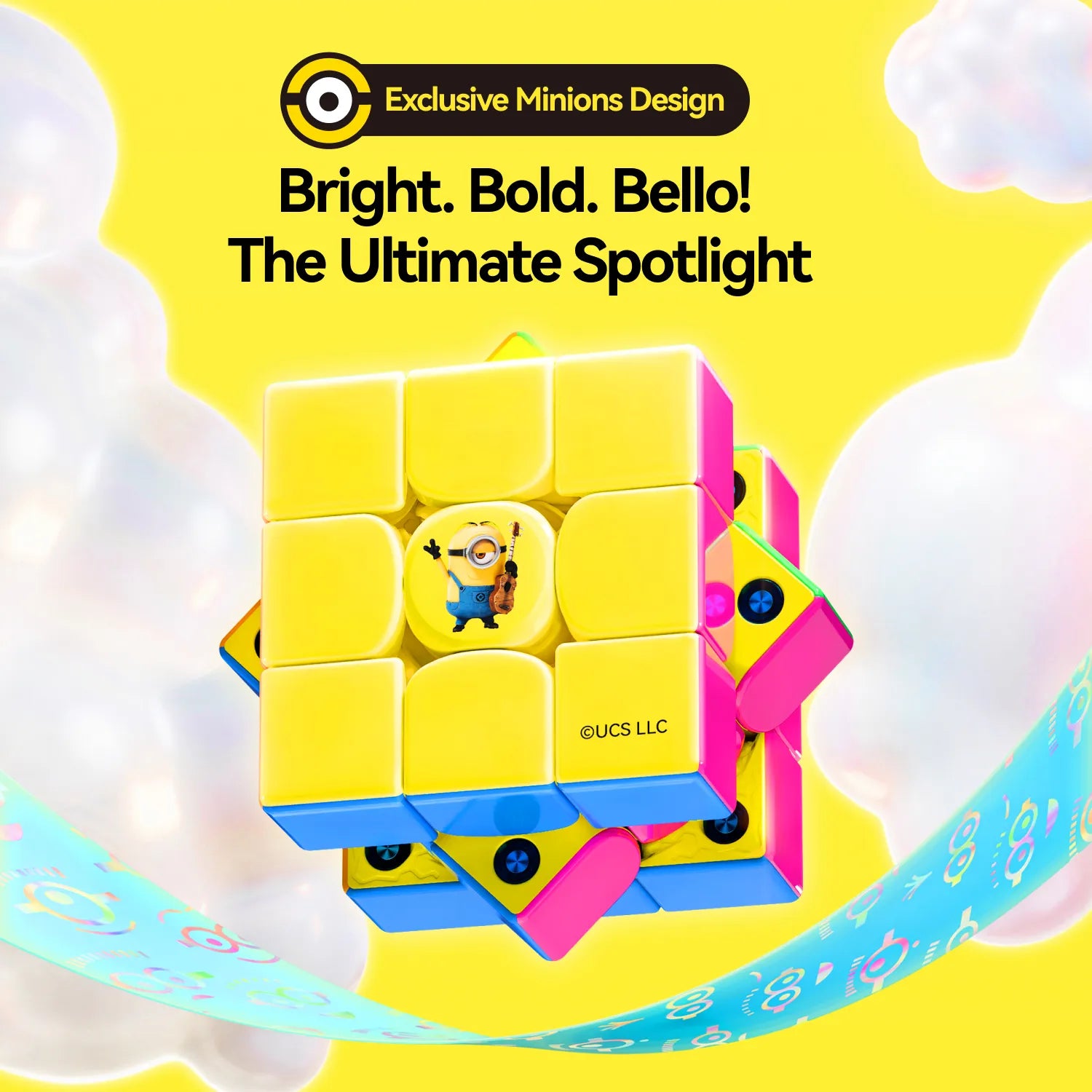 Minions-themed speed cube with bright yellow, pink, and blue colors, featuring a Minion character on the center tile.