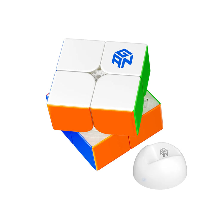 GAN speedcube 2x2 puzzle with colorful sides and white display stand, GANCUBE logo visible