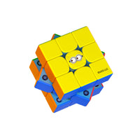 Colorful speed cube with Minion eyes design, featuring yellow, blue, and orange panels.